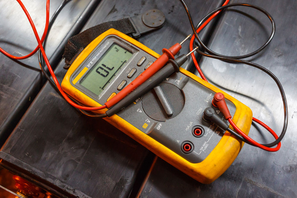 A multimeter reading showing OL (overload)