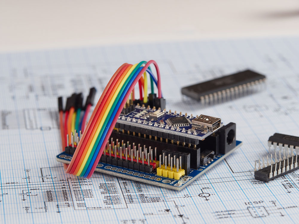 An Arduino microcontroller with an expansion board