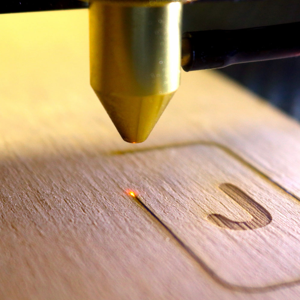 The engraving process using a laser cutter