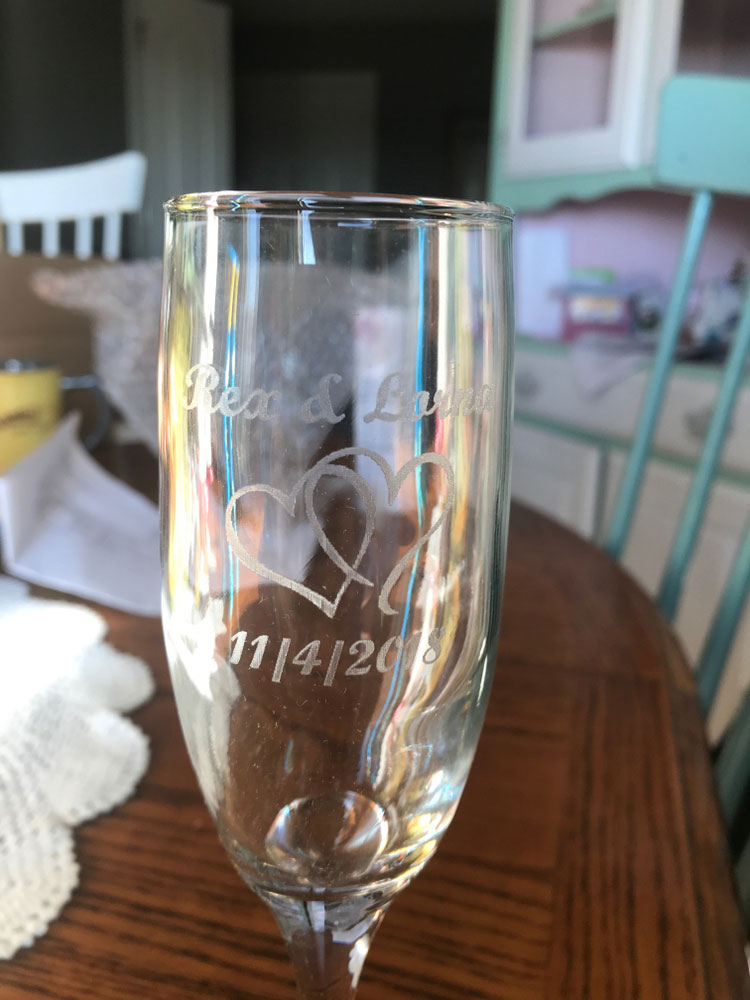 A wedding glass etched to match the occasion