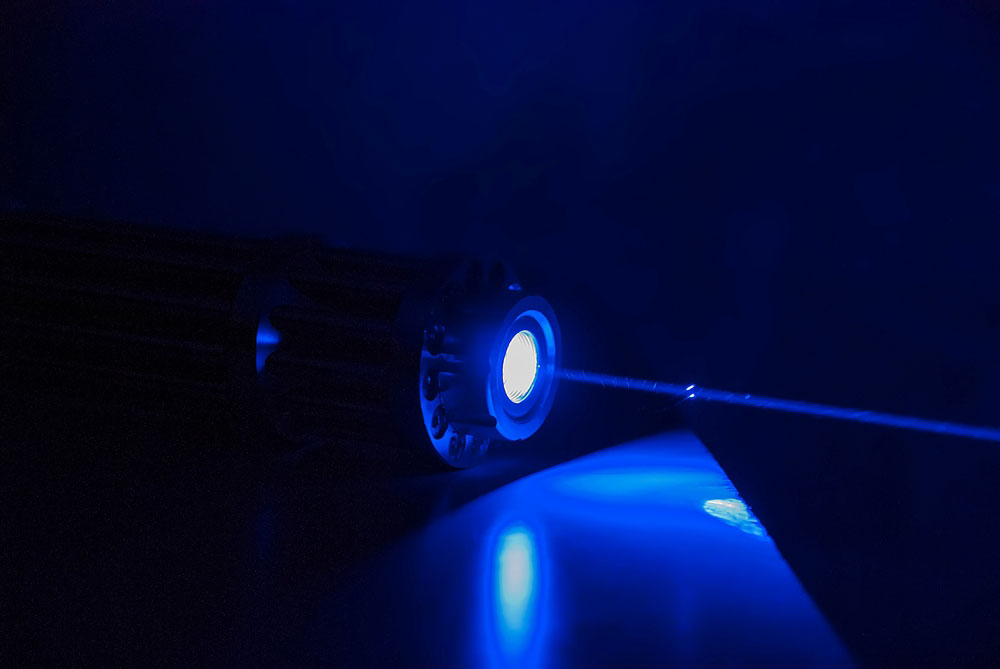 A blue laser pointer capable of burning paper