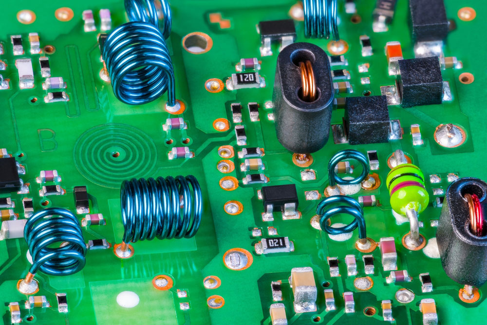 A circuit board with surface mount and thru-hole components