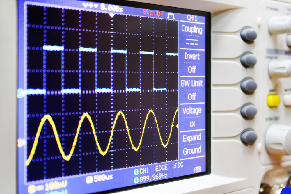 A digital wave with logic highs (1) and logic lows (0)