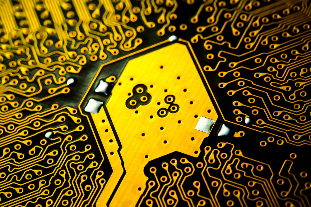 A PCB with gold-coated vias/through holes