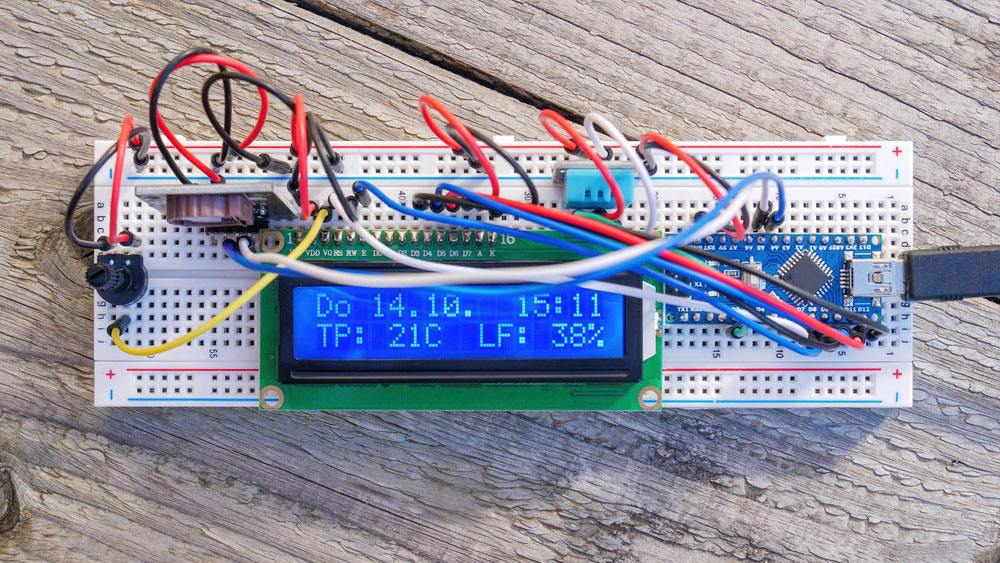 A breadboard electronics project with jumper wires mounted in the socket holes