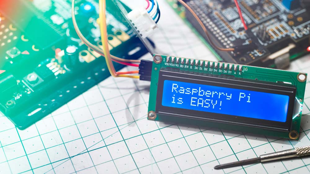 A STEM education Raspberry Pi project with an LCD screen indicating “Raspberry Pi is EASY.”